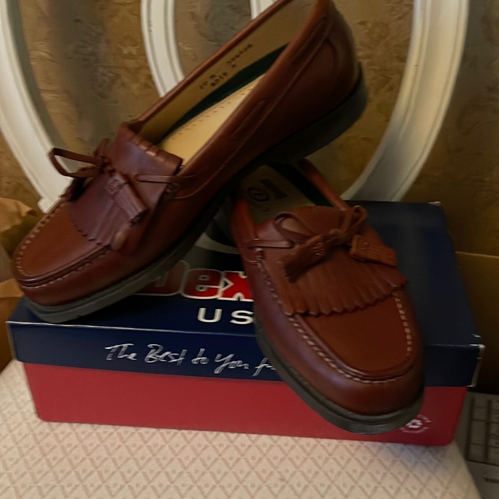 Dexter tassel loafers with comfortable rubber sole.  Appear to be brand new